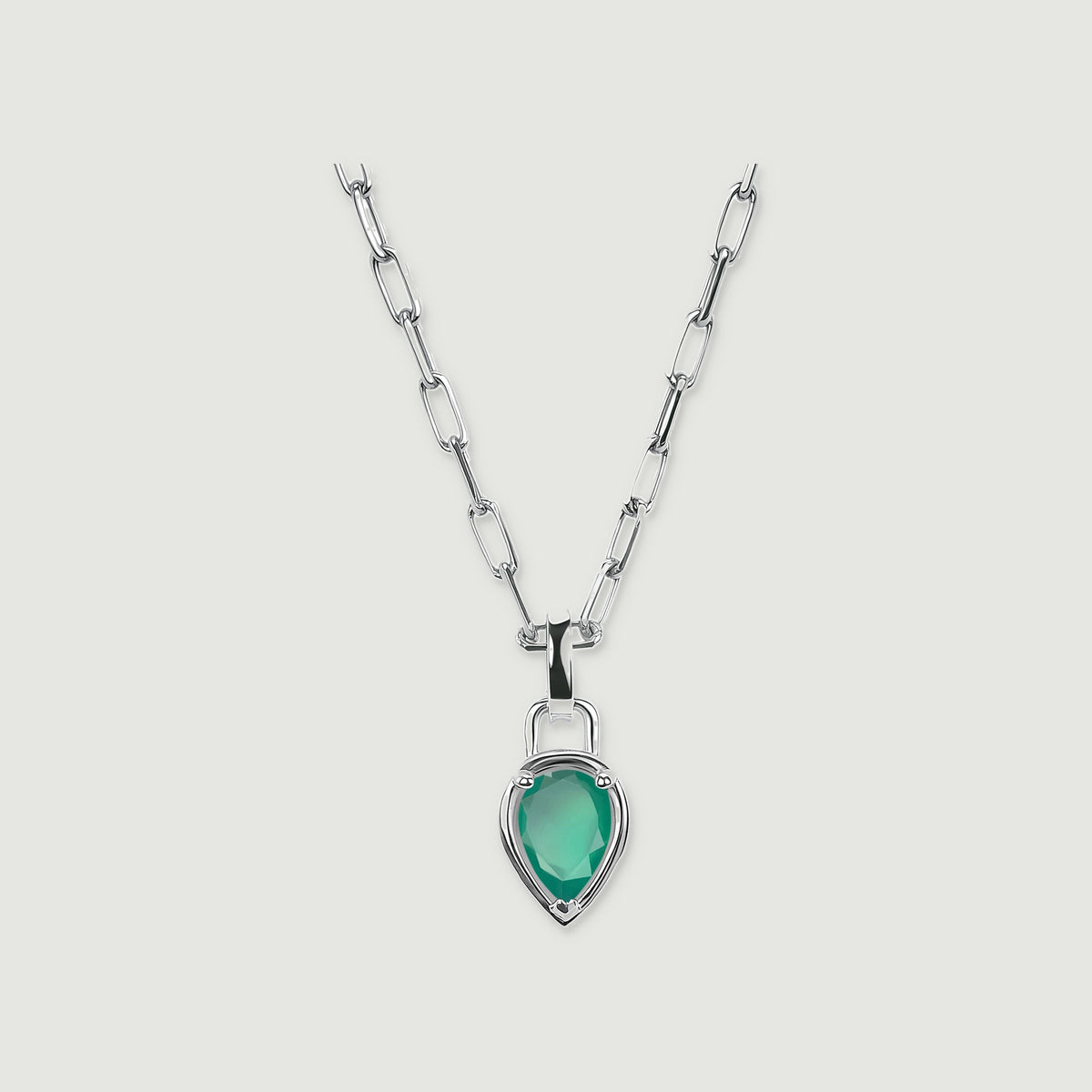 A white rhodium plated necklace shows a faceted green pear pendant beneath a polished bail on light gray.