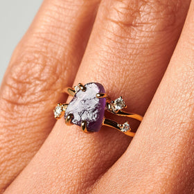 10kt yellow gold amethyst ring worn close on a hand