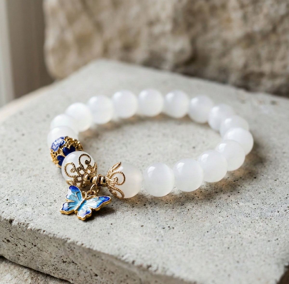Celestial Wings: Moonstone & Blue Enamel Butterfly Bracelet