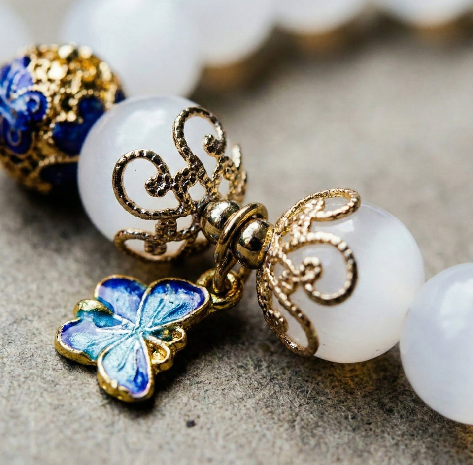 Celestial Wings: Moonstone & Blue Enamel Butterfly Bracelet