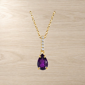 White zircon accent beside amethyst