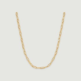 A yellow gold chain necklace forms a smooth U with elongated open links on a light gray background.