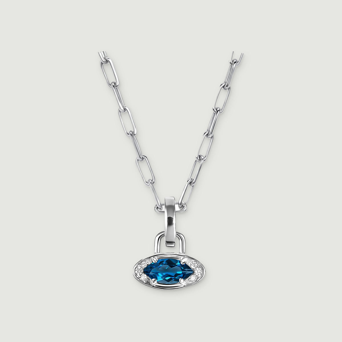 A silver-tone rectangular-link necklace has a horizontal blue gemstone pendant on a light gray background.