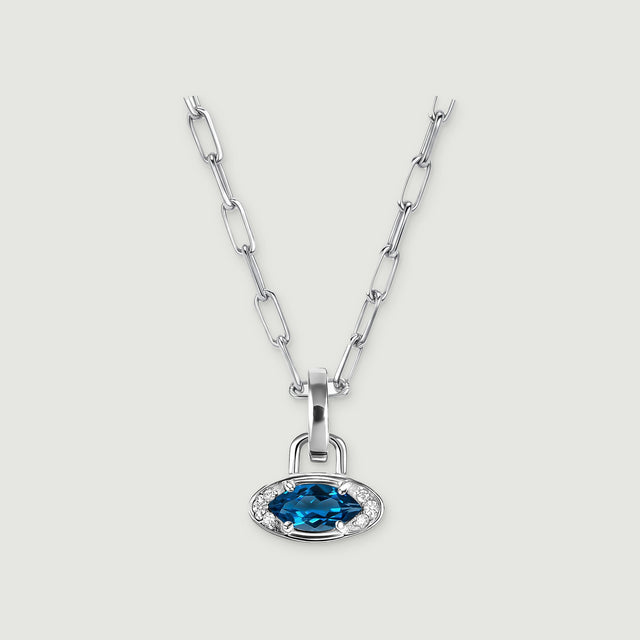A silver-tone rectangular-link necklace has a horizontal blue gemstone pendant on a light gray background.