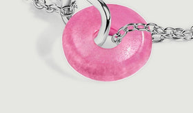 A close flat view shows the rounded pink quartz pendant threaded through a polished silver connector.