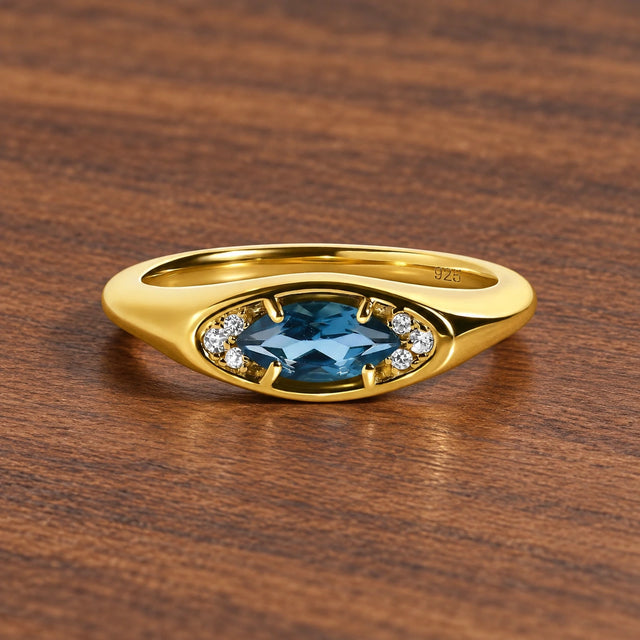 Clear Horizon blue topaz eye ring, gold main