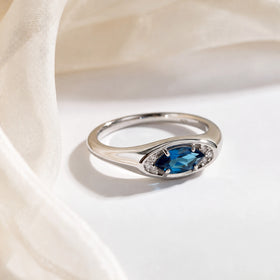 Clear Horizon blue topaz eye ring, silver flatlay