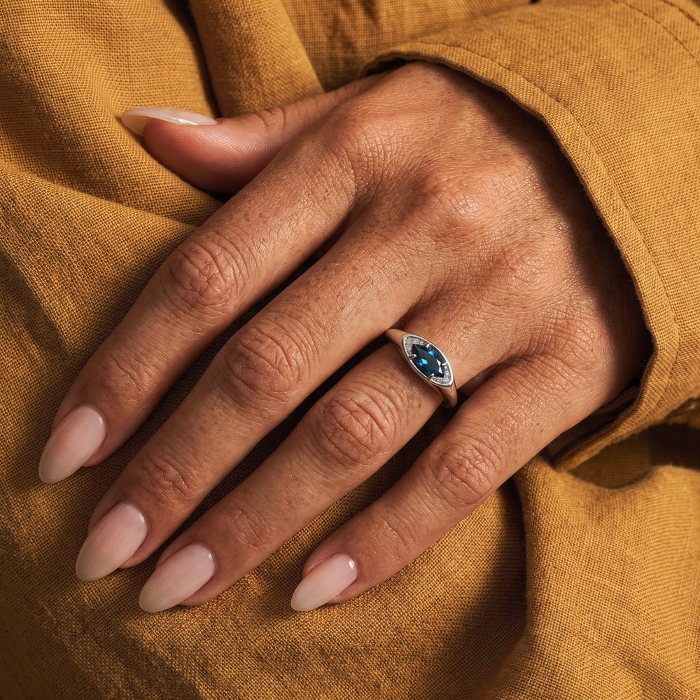 Clear Horizon blue topaz eye ring, silver wear