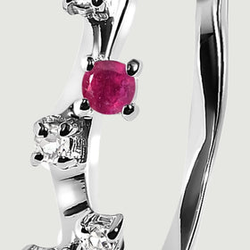 A close-up shows the pink-red stone, clear accents and polished surfaces of a sterling silver ring.