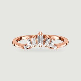 A rose gold vermeil band holds a fan of clear rectangular stones with round accents at both ends.