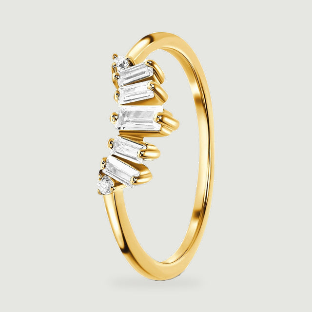 An upright yellow gold vermeil band shows its slim shank and raised clear stone setting from the side.