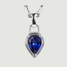 A front detail of the silver-tone pendant shows three prongs around the blue pear-shaped gemstone.