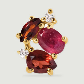 A close view of one yellow gold vermeil earring shows an oval pink center stone framed by marquise and pear shaped red stones.