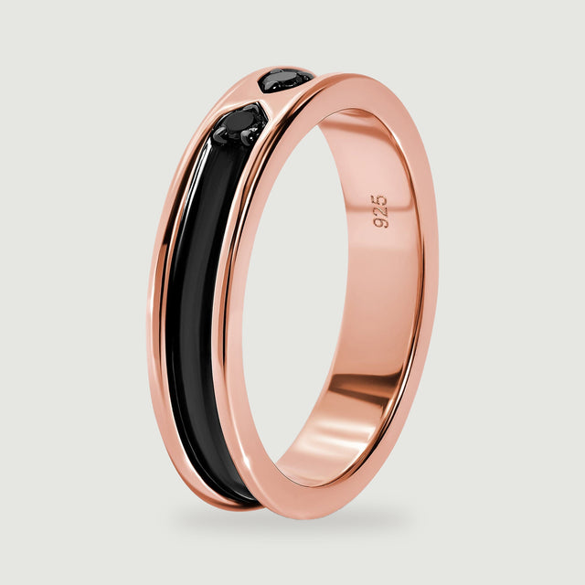 The upright rose gold ring shows its curved black inlay and the 925 stamp inside the band.