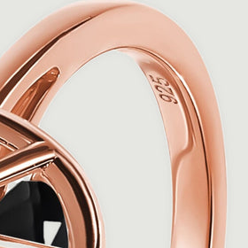 The inner curve of the rose gold band shows a small 925 purity stamp beside a bright polished edge.
