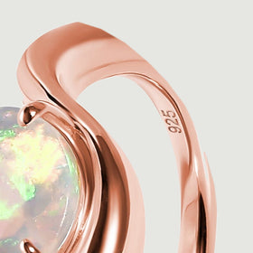 A close view shows the smooth rose gold band and the 925 stamp on its inner surface.