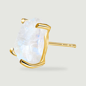 The side of a yellow gold moonstone stud reveals its open setting and straight post.