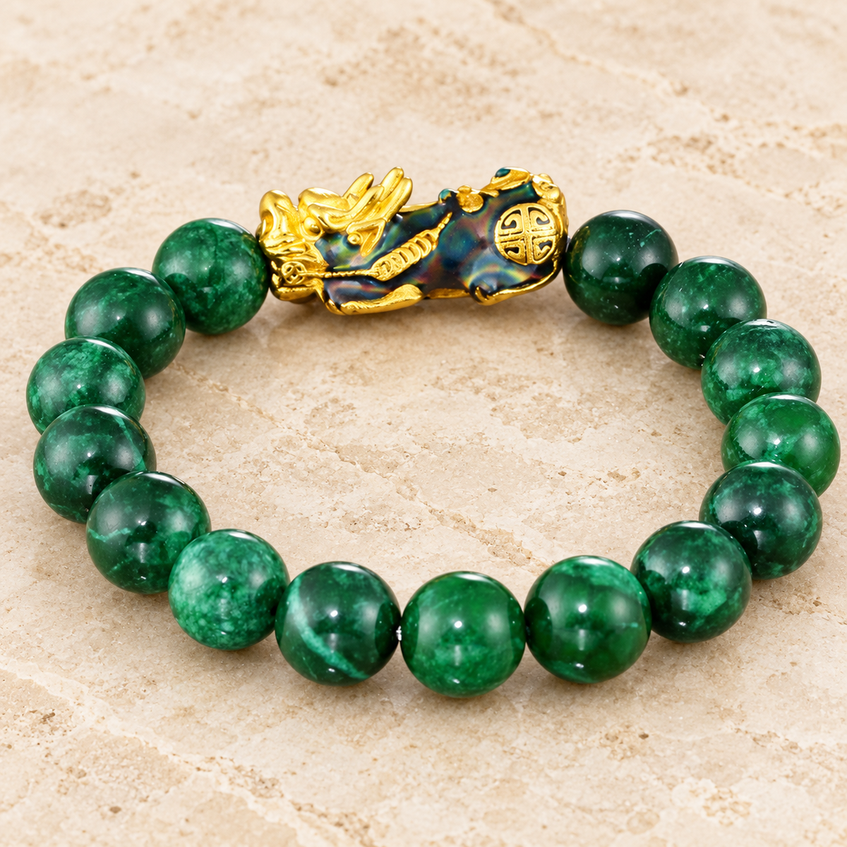 Green jade bead bracelet showing the PiXiu charm and rounded bead arrangement.