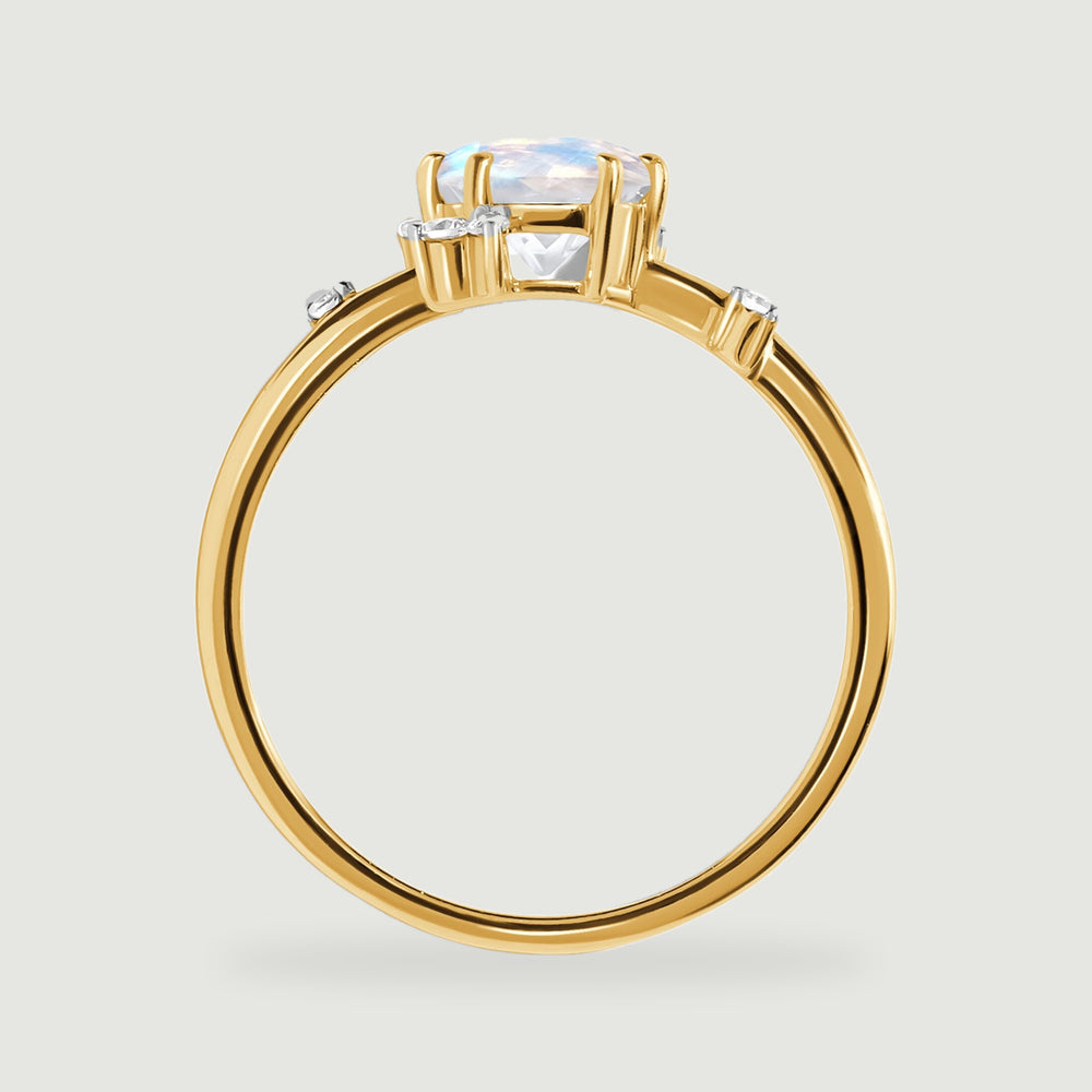 The yellow gold ring is shown from the side with a raised prong setting and an open circular band.