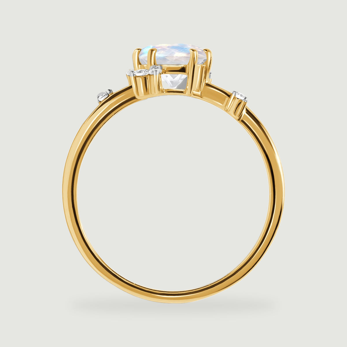 The yellow gold ring is shown from the side with a raised prong setting and an open circular band.
