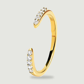 A side view of the yellow gold ring shows the polished inner band and raised stone settings.