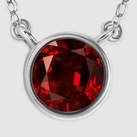 A detailed view reveals the white gold setting around the garnet and the links attached at each side.