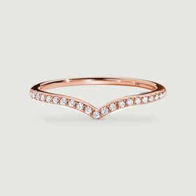 A rose gold diamond band is shown from the front with a curved back and a gently pointed centre.