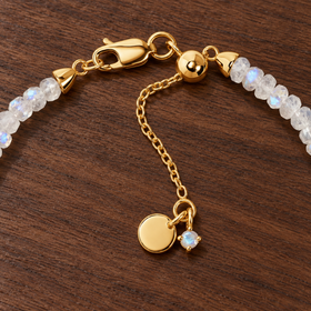 Lunar Tide rainbow moonstone bracelet, yellow gold vermeil detail view. One bracelet; photo props not included.