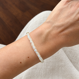 Lunar Tide rainbow moonstone bracelet, yellow gold vermeil wrist scale view. One bracelet; photo props not included.