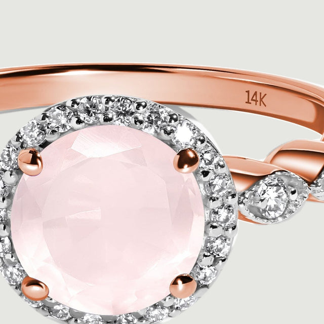 A 14K stamp is visible inside the polished rose gold band above the diamond halo.