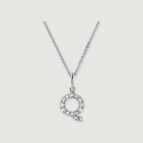 A silver chain holds a stone-set letter Q pendant against a light gray background.