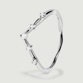 An angled side view of the white gold ring shows five round diamonds along the contoured band.