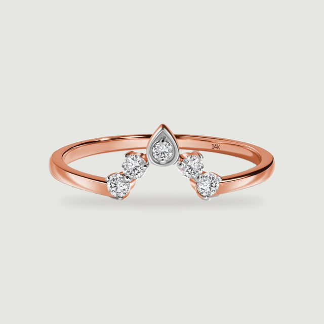 A rose gold ring has four round diamonds beside a central diamond in a teardrop-shaped setting.