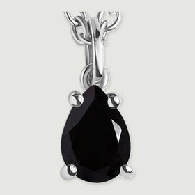 The silver-colored pendant loop and four-prong setting frame a reflective pear-shaped black stone.