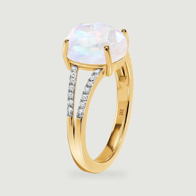 The side view shows the raised four-prong setting and polished yellow gold band.