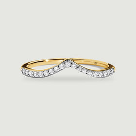 A yellow gold ring with a raised central point and bright round stones is shown from the front.