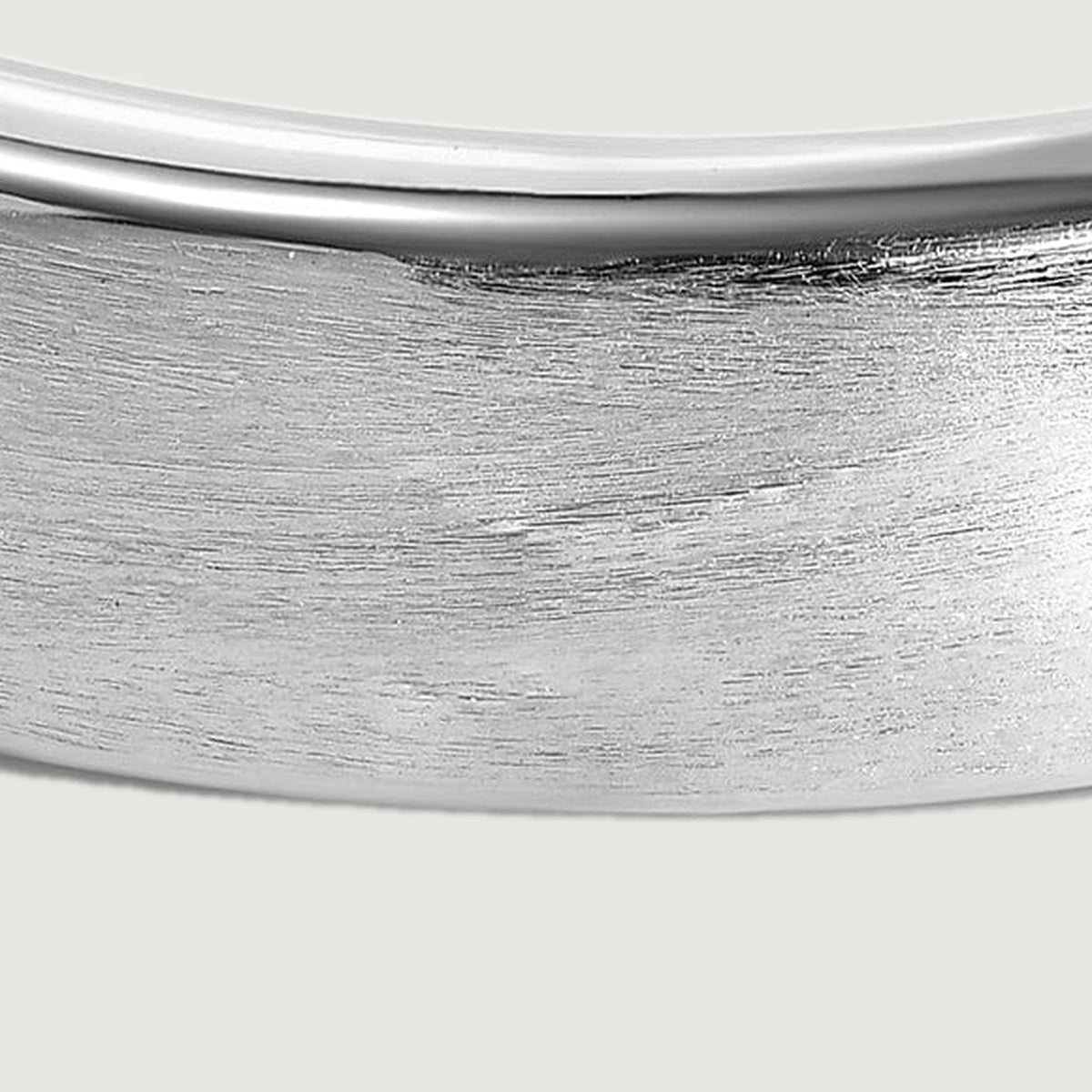 Fine horizontal brushing covers the silver band below its narrow polished rim.