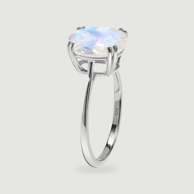 The white gold ring is shown from the side with its open basket and slender band visible.