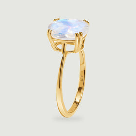 A side view shows the yellow gold supports beneath the oval stone and the curved ring shank.