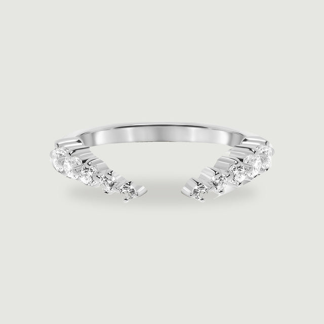 A polished sterling silver open ring displays two curved rows of round clear stones on a light gray background.