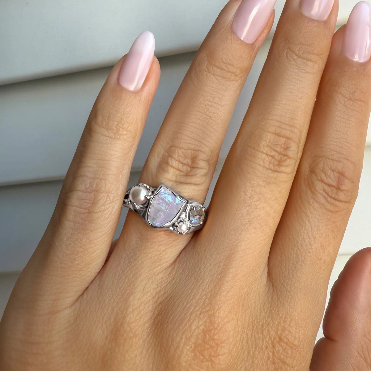 Tidal Bloom moonstone pearl cluster ring, sterling silver, close view on hand