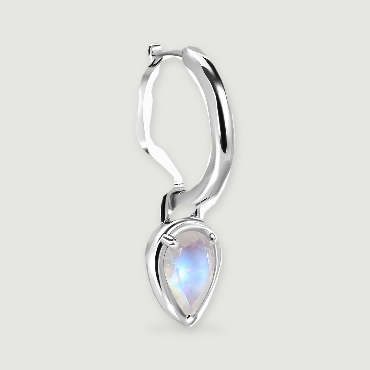 A single silver-tone hoop is shown at an angle with its pear-shaped moonstone pendant.