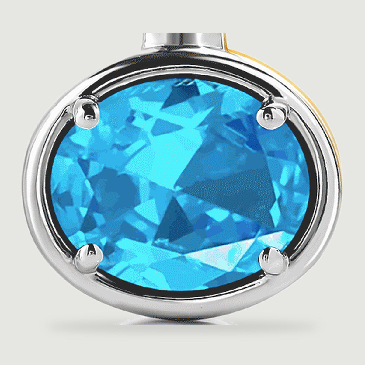 A bright blue faceted oval gemstone sits inside a polished silver-colored rim with four rounded prongs.