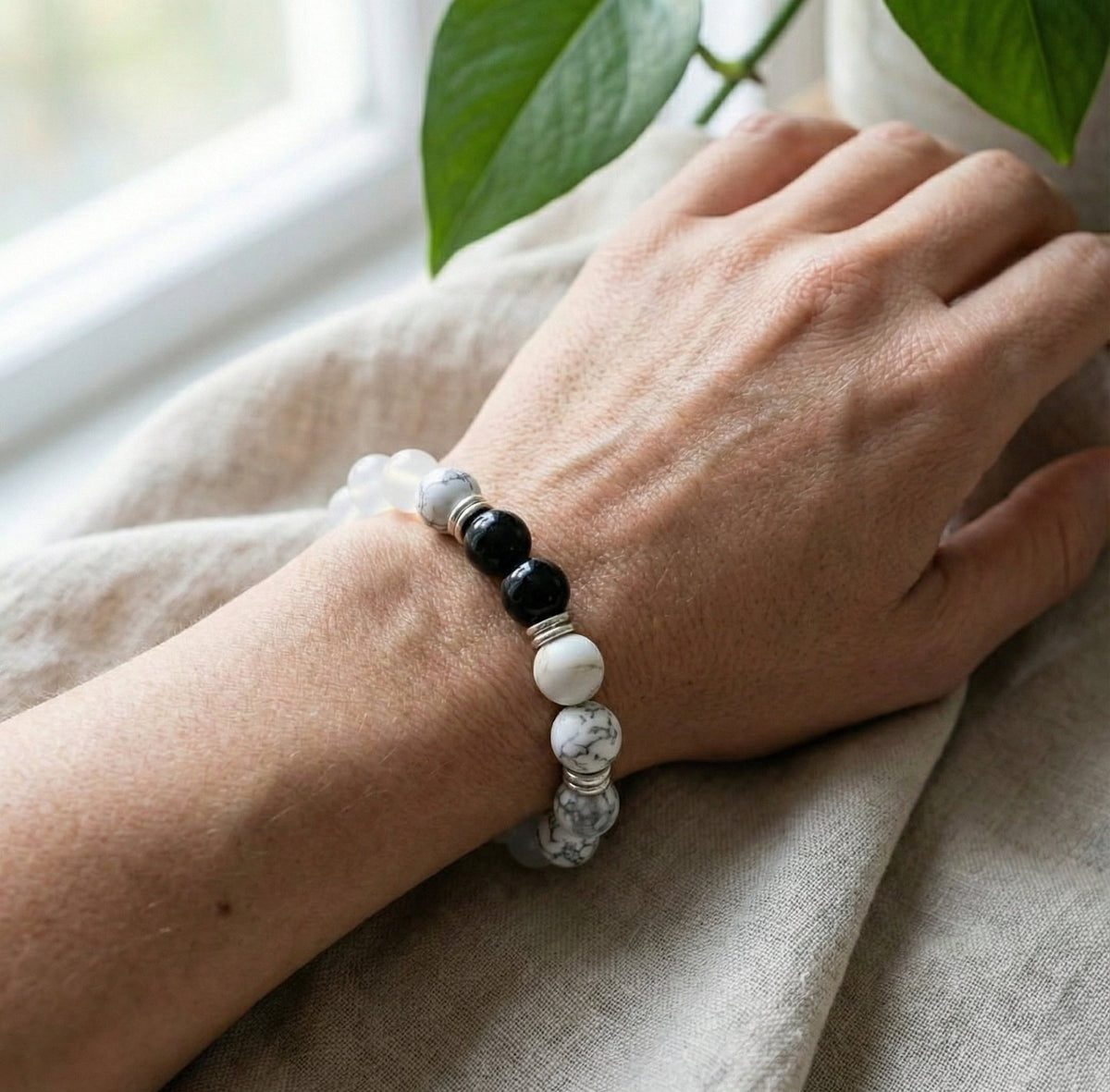 The Harmony Shield: Obsidian & Howlite Protection Bracelet